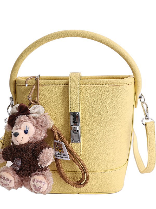 Litchi estampado bolso de cubo de mano mujer 2026 venta caliente nueva moda coreana alta textura mochila de hombro