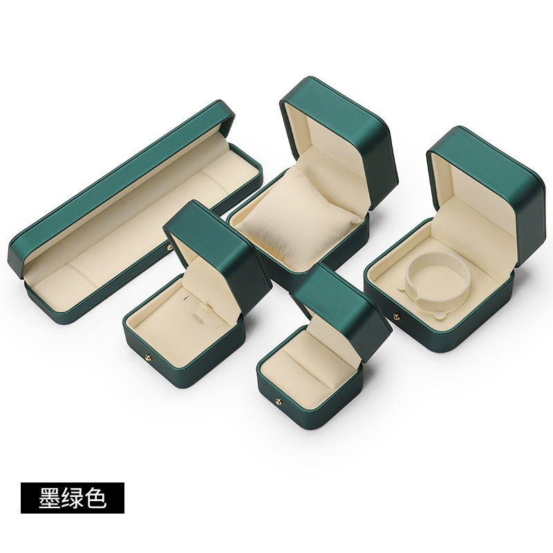 Caja de joyería de cuero de PU de borde dorado redondeado al por mayor caja de regalo de joyería de gama alta caja de reloj caja de joyería colgante de anillo