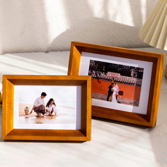 Customize and wholesale frame 6-inch, 7-inch, and A4 wooden minimalist photo prints into tabletop frames, and create custom-sized framed and matted artwork.