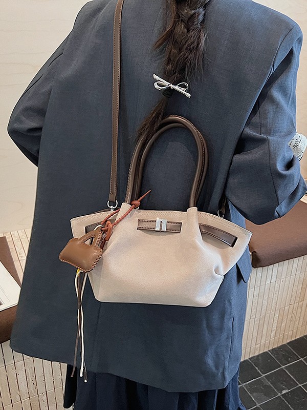 Cestas de platos de mano bolsas de cubo mujeres 2025 nuevo cross-border europeo y americano retro mochila de piel de ciervo esmaltado