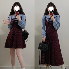 秋冬のレトロな学院の風の大衆のデザイン感の偽の2つの格子縞のワンピースの女性は腰を収めてやせている優しさの気質のスカートを現します。
