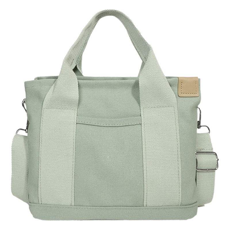 2023 nuevo pequeño bolso de mano de color sólido lindo simple bolsa de lona bolsa de almuerzo de moda bolso elegante