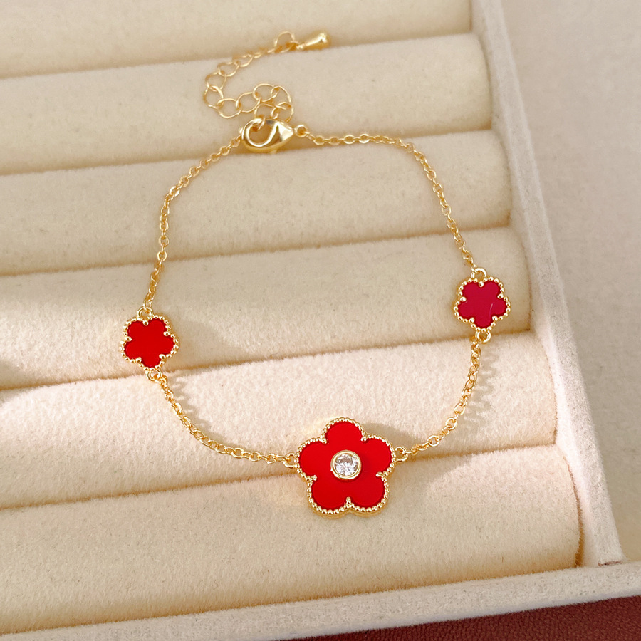 Collar de orejas de piedra de oro real, collar de orejas de flores de lujo ligero, collar de clavícula de nicho, conjunto de joyas simples y dulces.