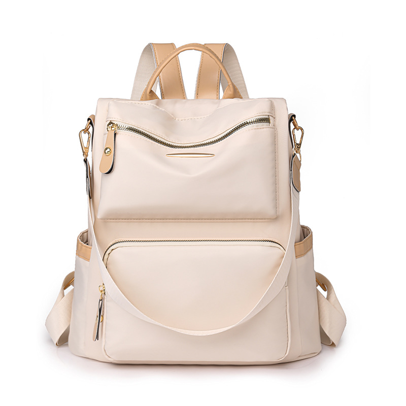 Mochila antirrobo para mujer 2025 primavera nuevo estilo color de contraste mochila para mujer moda viajero multifunción mochila de doble uso