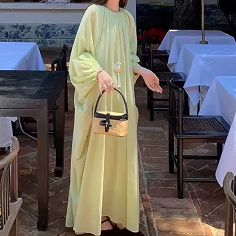 2026春季新款法式慵懒风宽松大摆连衣裙灯笼袖度假风长款茶歇裙