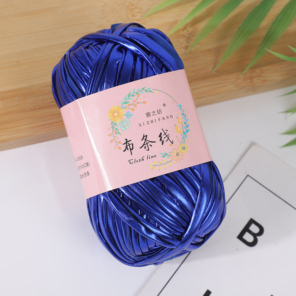 Línea textil Qian Zhi hilo de color mágico tejido a mano hilo de fantasía de color bricolaje en stock fábrica al por mayor