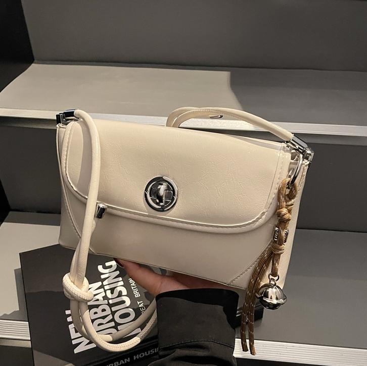 Bolsos debajo de las axilas de piel de cera retrógrada para mujeres 2025, nuevos bolsos de hombro de tendencia universal, bolsos de alta calidad coreanos.