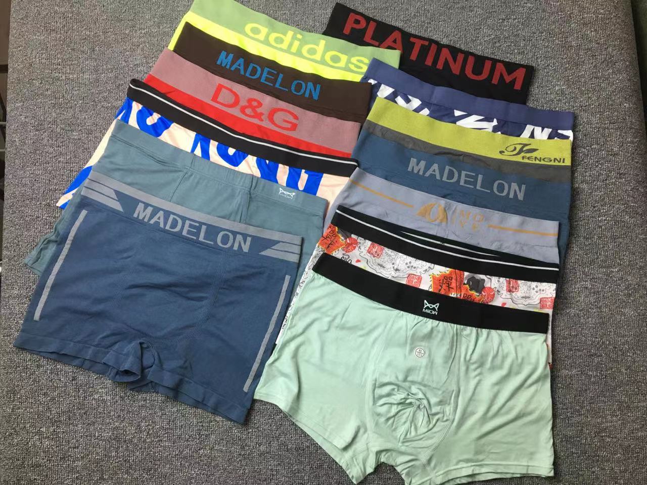 Diverso suelta más tamaño boxeadores ropa interior de moda al por mayor de los hombres El Comercio exterior europeo y americano sin costuras ropa interior ultrafina transpirable mezclado