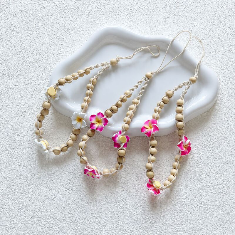 Bohemian Style Plumeria Flower Phone Chain Handmade Woven Wooden Bead Wrist Strap Phone Pendant Wholesale in Stock Bohemian Style Plumeria Flower Phone Chain Handmade Woven Wooden Bead Wrist Strap Phone Pendant Wholesale in Stock