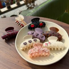 新商品の愛の花のポイントのドリルはinsの果物の愛の髪飾りのピンの中の号の気質の半分は髪を刺してつかみます。