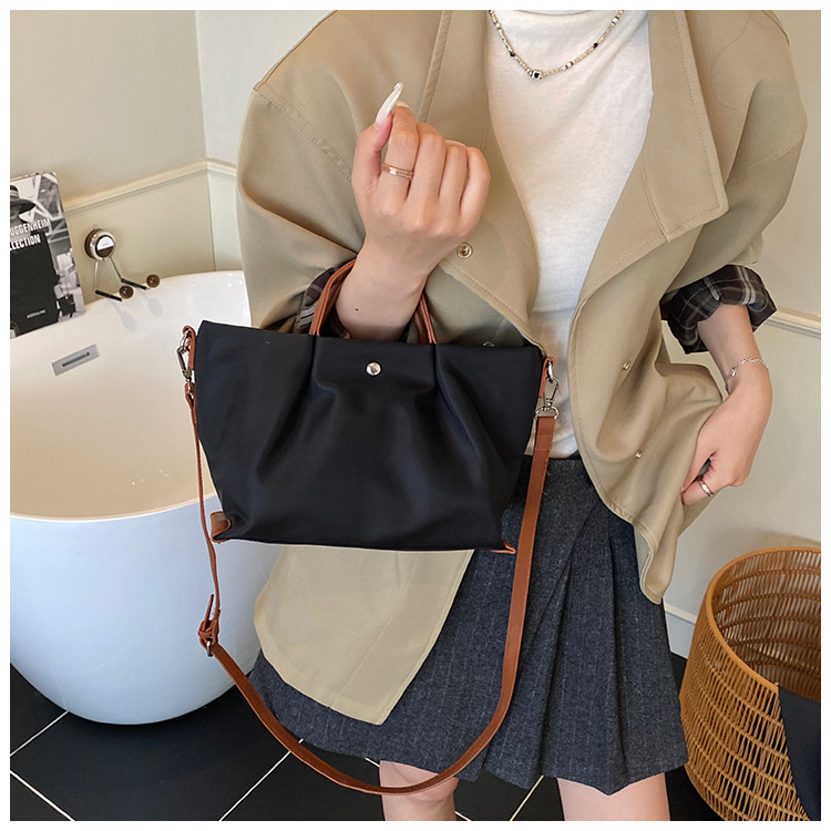 Borsa a tracolla casual da donna in tessuto Oxford, capiente, elegante e versatile, ideale per gli spostamenti quotidiani._voghion.com