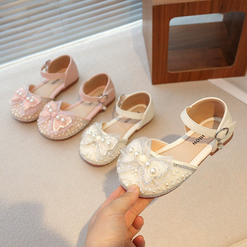 Принцесс туфли для девочек на мягкой подошве хрустальные туфли 2025 полые туфли детская обувь стразы детские сандалии