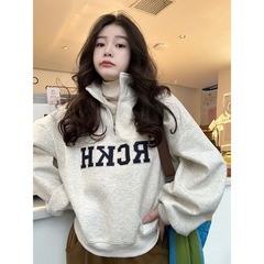 半ファスナーの立襟の衛衣の女性の春秋の薄い金の2025新型のゆったりしていて怠惰な風の小さい背の短い上着