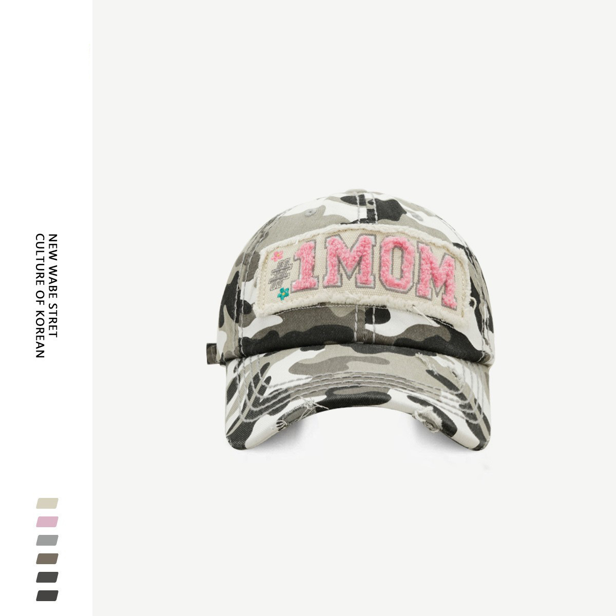 Toalla de diseño original carta bordada etiqueta de tela gorra de béisbol hombres y mujeres Otoño e Invierno estilo coreano moda de la calle rasgado gorra de pico