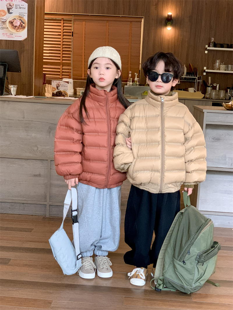 Estilo coreano abajo chaqueta para niños y niñas 2023 invierno nuevos niños estándar nacional 90 pato blanco abajo color sólido parche pan abrigo moda