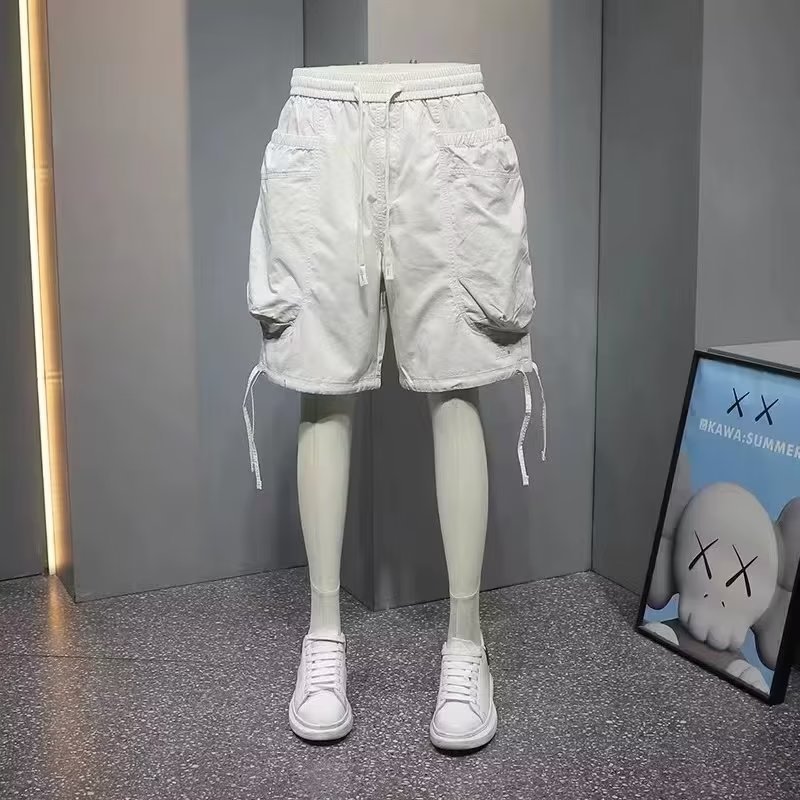 Moda 2024 nuevo estilo herramientas recto casual hombres sueltos de verano pantalones de moda sueltos control de imagen de fondo blanco