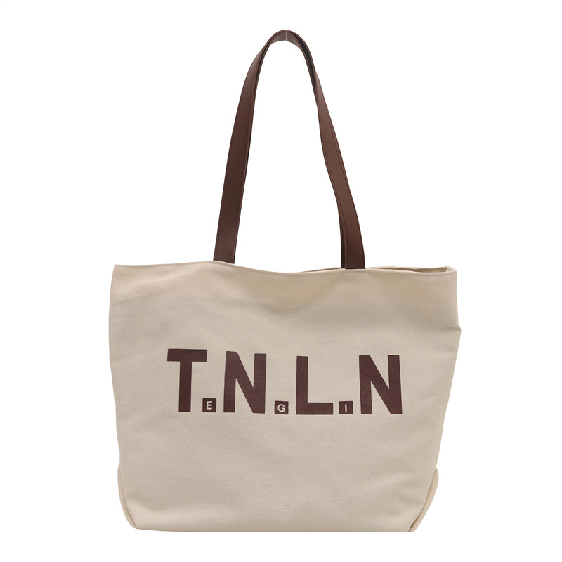 Bolsa de lona de gran capacidad para mujeres 2025, primavera y otoño, nueva literatura y moda, bolso de hombro, letras casuales, bolso de viaje