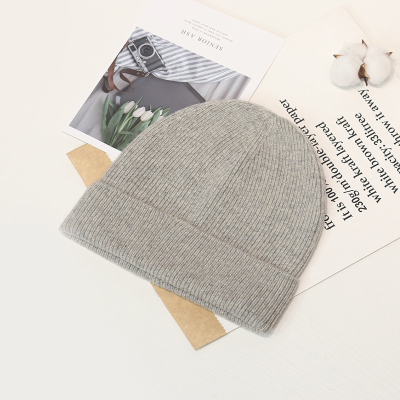 Estilo coreano de moda todo fósforo de color sólido sombrero de punto de una sola capa cómodo sombrero de lana suave y rizado otoño e invierno hombres y mujeres mismo cálido