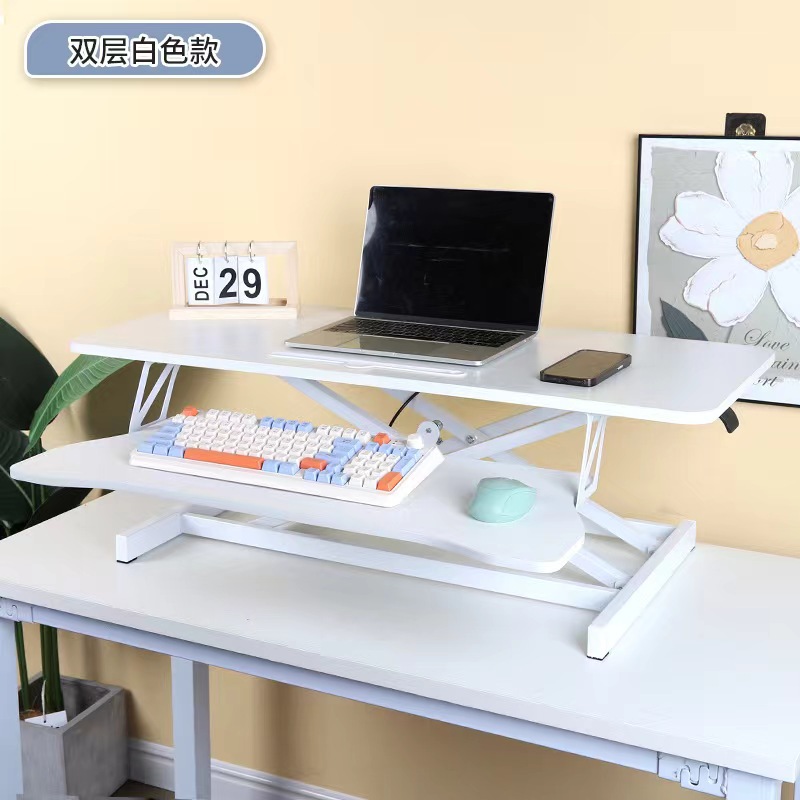 気動机の上のコンピュータの机は立式の事務室の台の上に立って高くなるノートの折り畳みの机で机を昇降することができます。