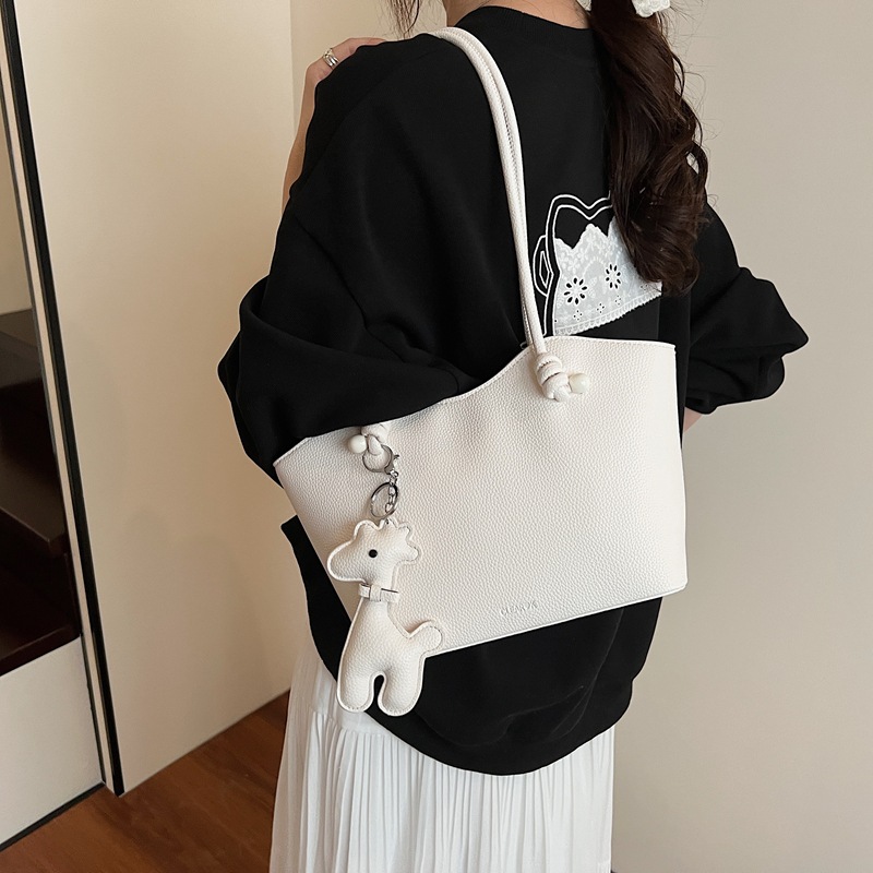 Moda de alta gama, todo fósforo, gran capacidad, bolso Tote de cercanías, mujer 2025 nuevo bolso de hombro de color sólido casual simple