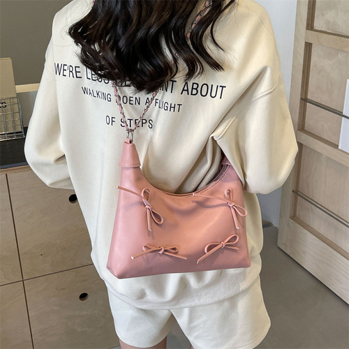 Niche Fashion Bow Armpit Bag Women's 2024 New Versatile High-Quality Textured Solid Color Commuting Shoulder Crossbody Bag