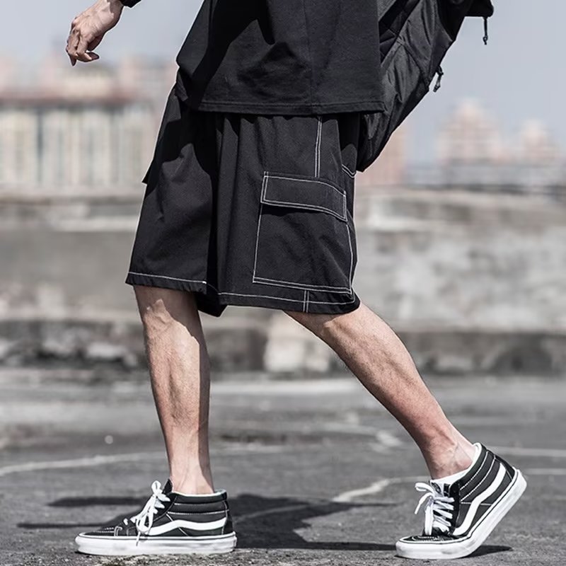 Pantalones cortos estadounidenses de cinco puntos de marca de moda para hombres de verano al por mayor pantalones finos de seda de hielo deportivos sueltos de gran tamaño súper transpirables