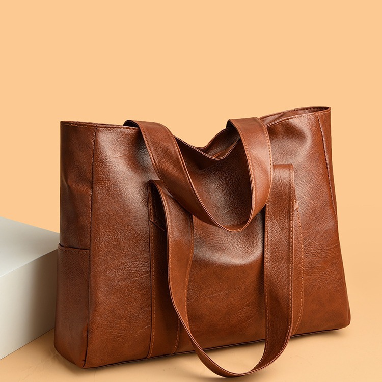 2024 European and American New Fashion Simple PU Soft Leather Trendy Handheld Tote Bag Large Capacity Shoulder Bag for Women_voghion.com