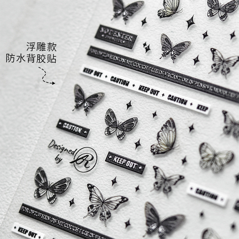 Tomoni en línea estilo de celebridad pegatinas de uñas cinta estilo de Chanel alivio mariposa letras inglesas estilo oscuro textura de uñas