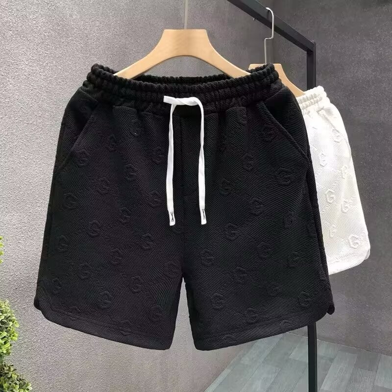 Pantaloncini bianchi jacquard alla moda con lettera G per pantaloni sportivi dritti larghi a cinque divisi estivi a nido d'ape da uomo_voghion.com