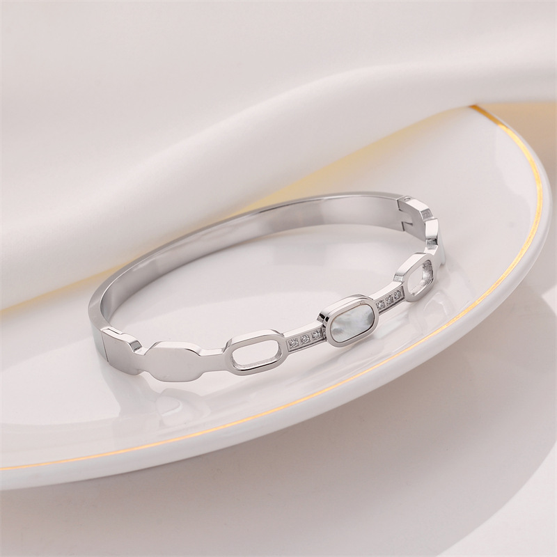 Pulsera de titanio y acero para mujer, diseño moderno y sencillo, pulsera de lujo que no se desvanece, venta al por mayor en stock.