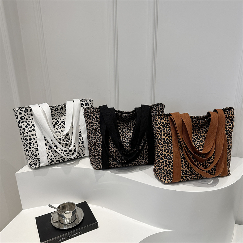 Bolso Tote con estampado de leopardo retro de moda 2024 otoño e invierno nuevo estilo bolsa de compras de gran capacidad viajero estilo occidental bolso de viaje mujer