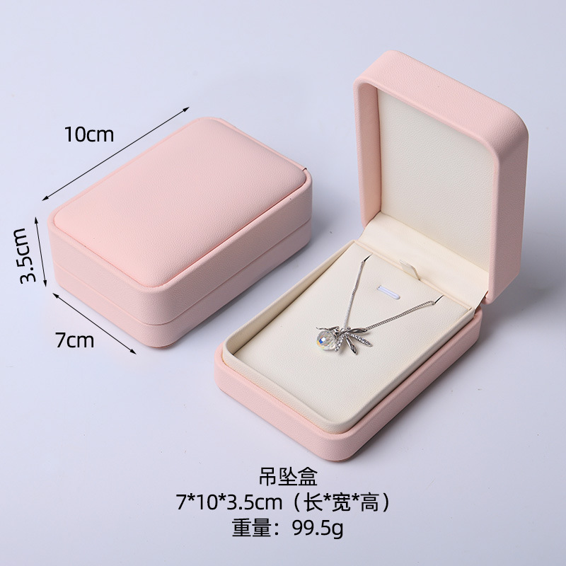 Caja de joyería rosa de alta calidad de cuero pu caja de embalaje de marca de joyería logotipo colgante pulsera collar caja de anillo