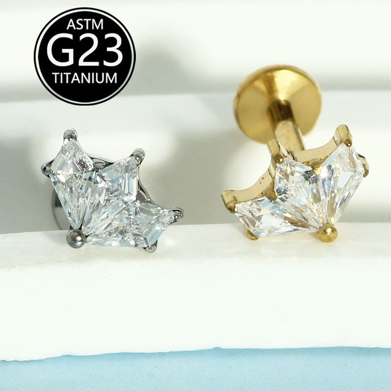 Silver pointed spike labret stud material detail