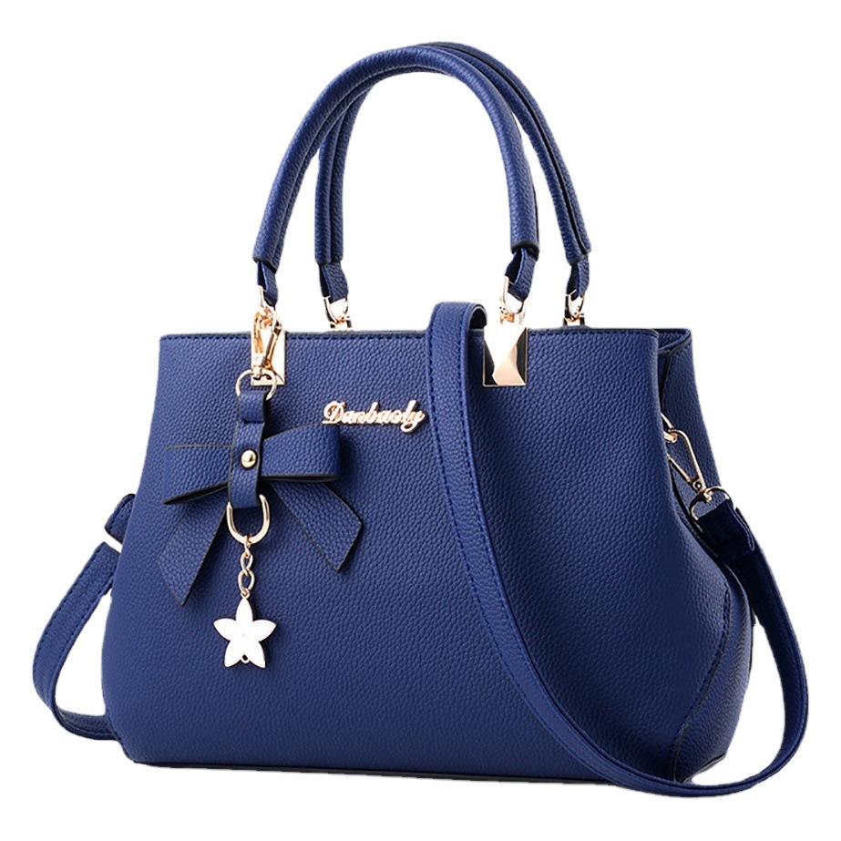 [Productos de Guangzhou] bolso de mujer de gran capacidad otoño 2025, bolso de boda con lazo de alta calidad para mujer