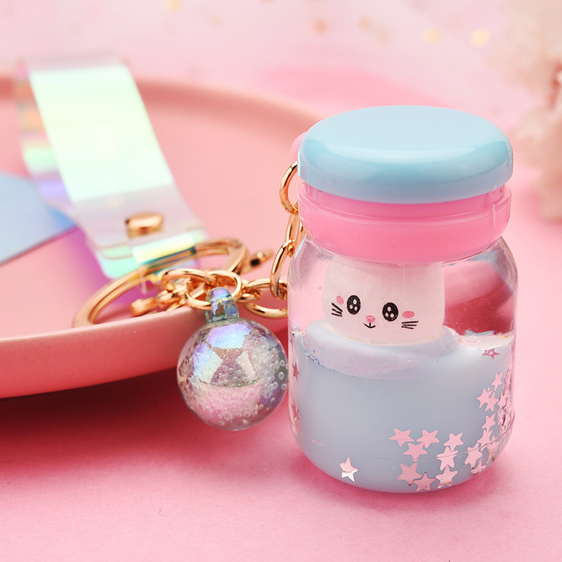 Cute Acrylic Simulation Yogurt Bottle Floating Kitten Doll Keychain Wholesale Nihaojewelry display picture 7