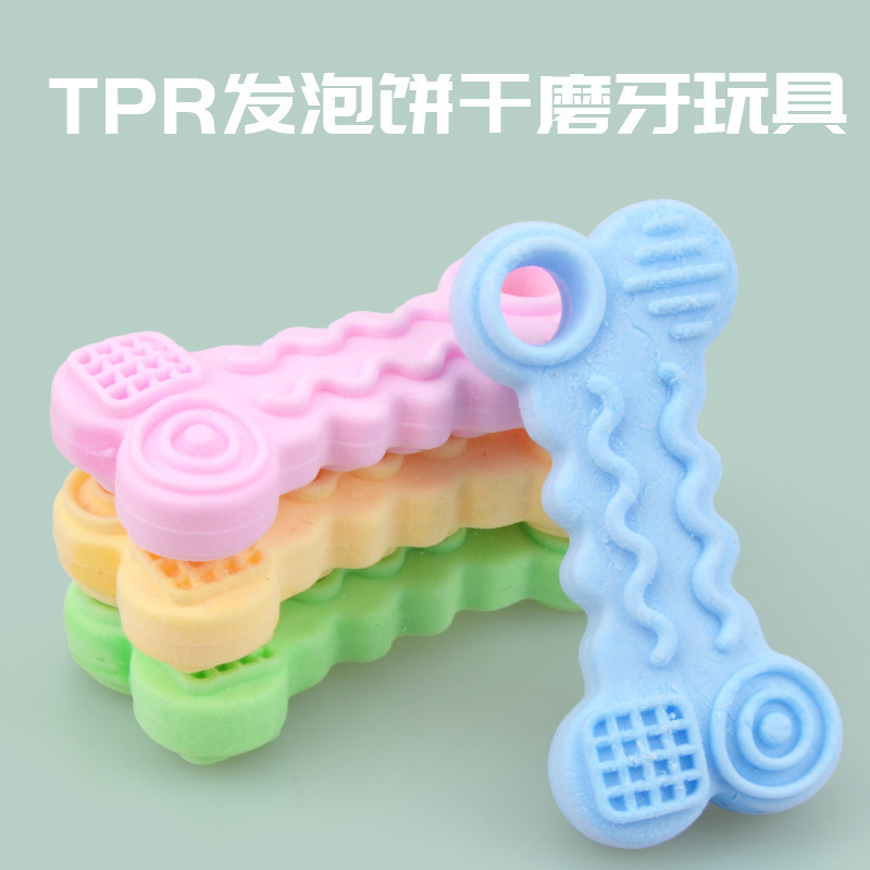 Fabricante perro juguete TPR leche sabor espuma curva hueso mordedura molar galleta juguete suministros