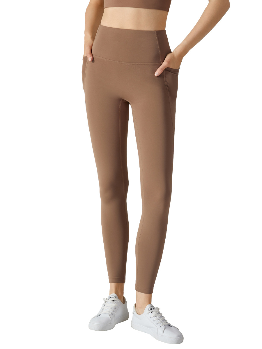 Europa y América más terciopelo yoga Otoño e Invierno pantalones de yoga cintura alta vientre contracción medias deportivas cálidas pantalones de bolsillo lateral de las mujeres