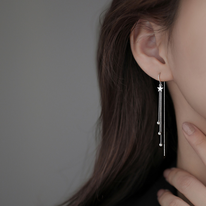Pendientes largos con borla y estrella, estilo francés elegante y romántico, cuentas luminosas, diseño exagerado para mujer