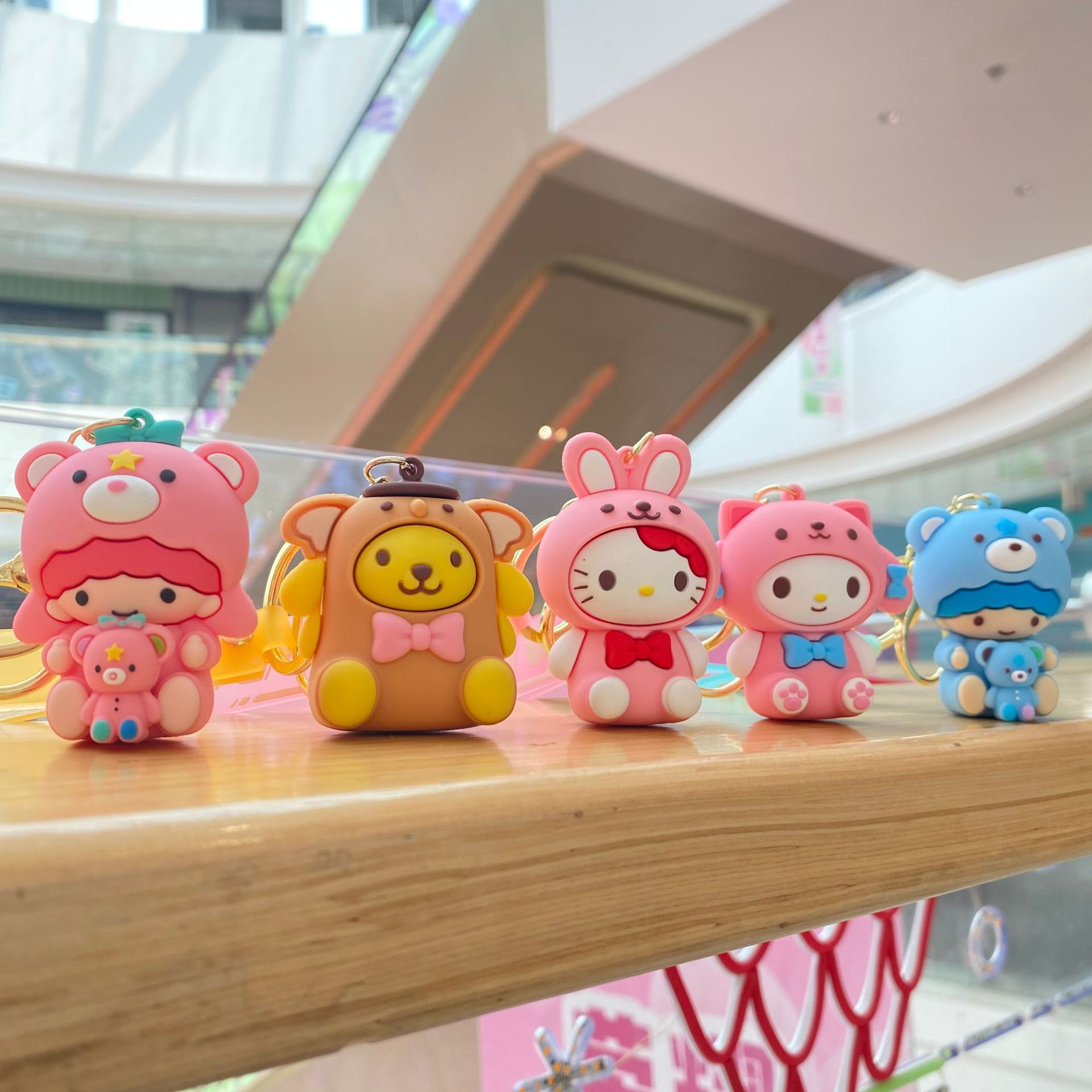 Nueva historieta Sanrio abrazo llavero coolomi muñeca mochila pareja coche Hello Kitty adornos regalo