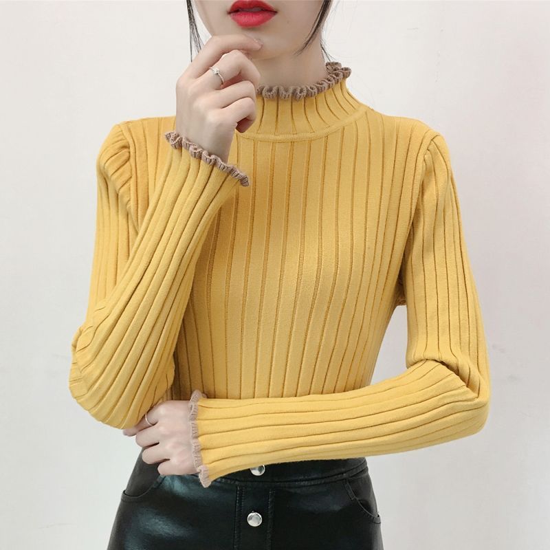 日本式のレースの半高襟のセーターの底のシャツの女性の秋冬の修身の中に白い上着を掛けます。