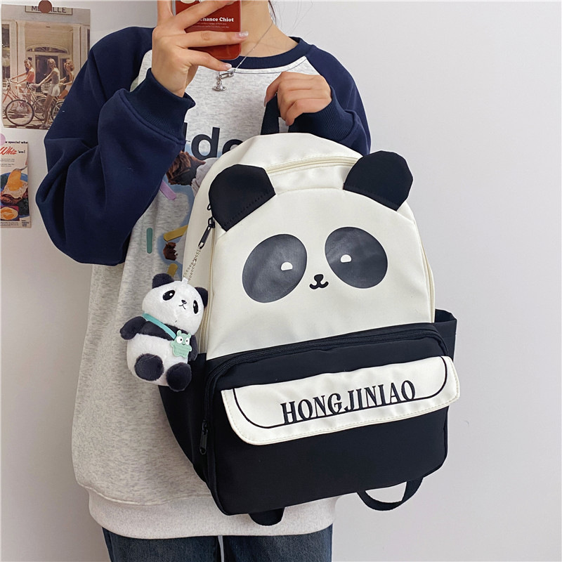 Nuevo cuadrícula universal mochila de chicas ociosas lindas caricaturas pandas mochila de escolares para estudiantes de secundaria primaria y secundaria