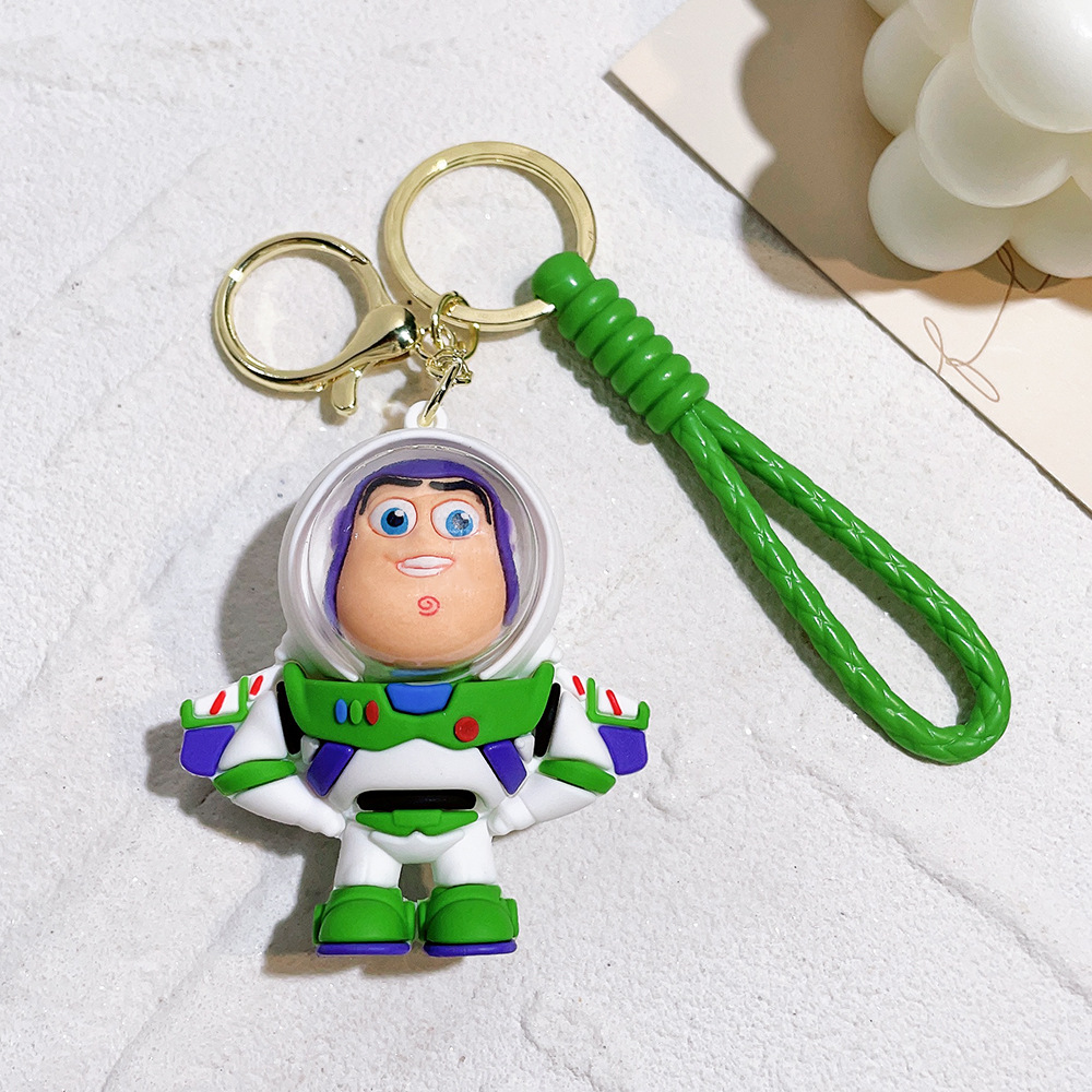 Llavero de silicona de Toy Story, el popular dibujo animado, con personajes como el alienígena de tres ojos, Buzz Lightyear y el oso Lotso, ideal como adorno para bolso.