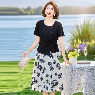 套装女夏季新款气质碎花两件套短袖蝴蝶结上衣年轻妈妈拼接半身裙