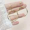 Golden mosquito coil, ear clips