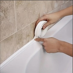 美縫は自粘美縫を貼り付けて台所の水槽のかまどのトイレの洗面器の縁を貼り付けます。
