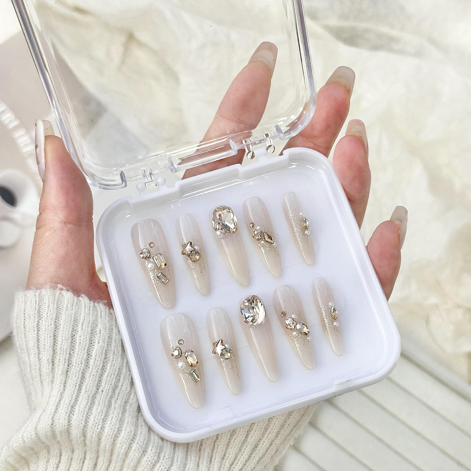 Caja de almacenamiento de uñas de desgaste hecho a mano cubierta transparente fondo rosa pieza de uñas de acrílico desgaste caja de embalaje de uñas al por mayor