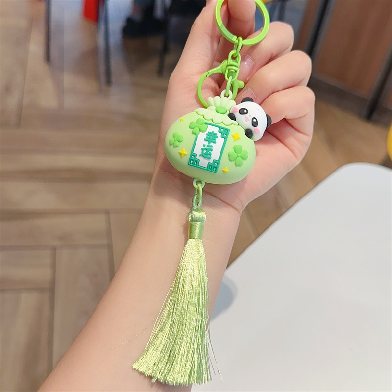 Muñeca de dibujos animados goteo llavero bolsas escolares exquisitas para hombres y mujeres colgantes para agarrar muñecas colgantes para el mercado nocturno regalos al por mayor