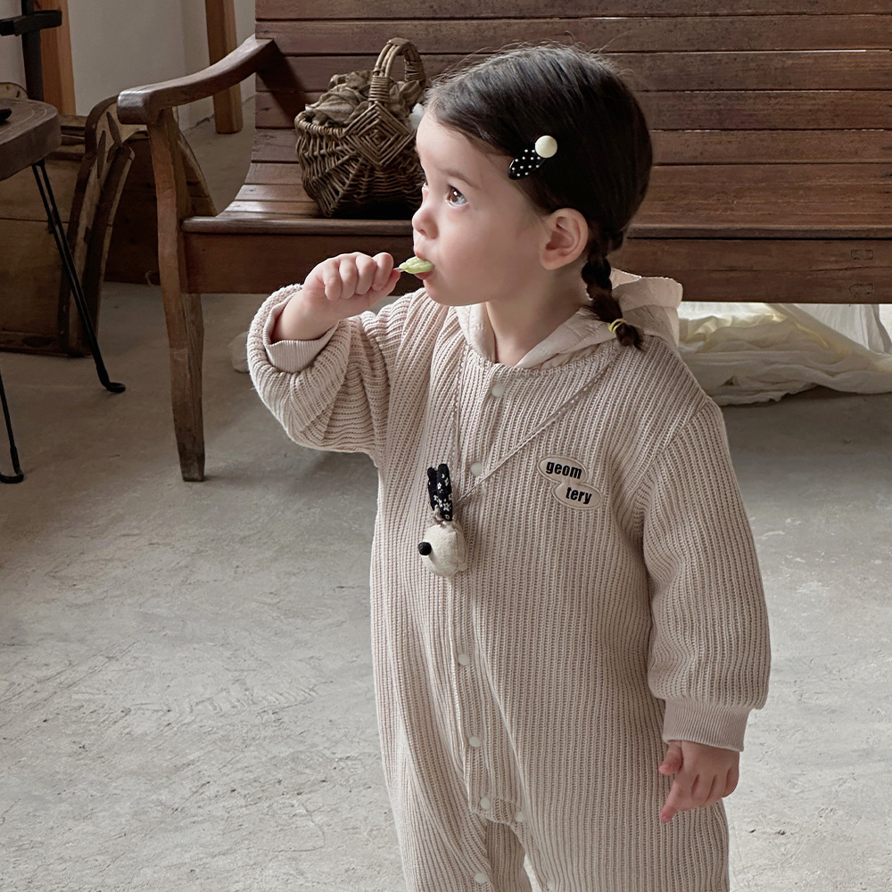 Ropa para niños coreanos otoño e invierno bebé hebilla completa mono tejido grueso acolchado ropa de salida de bebé con capucha