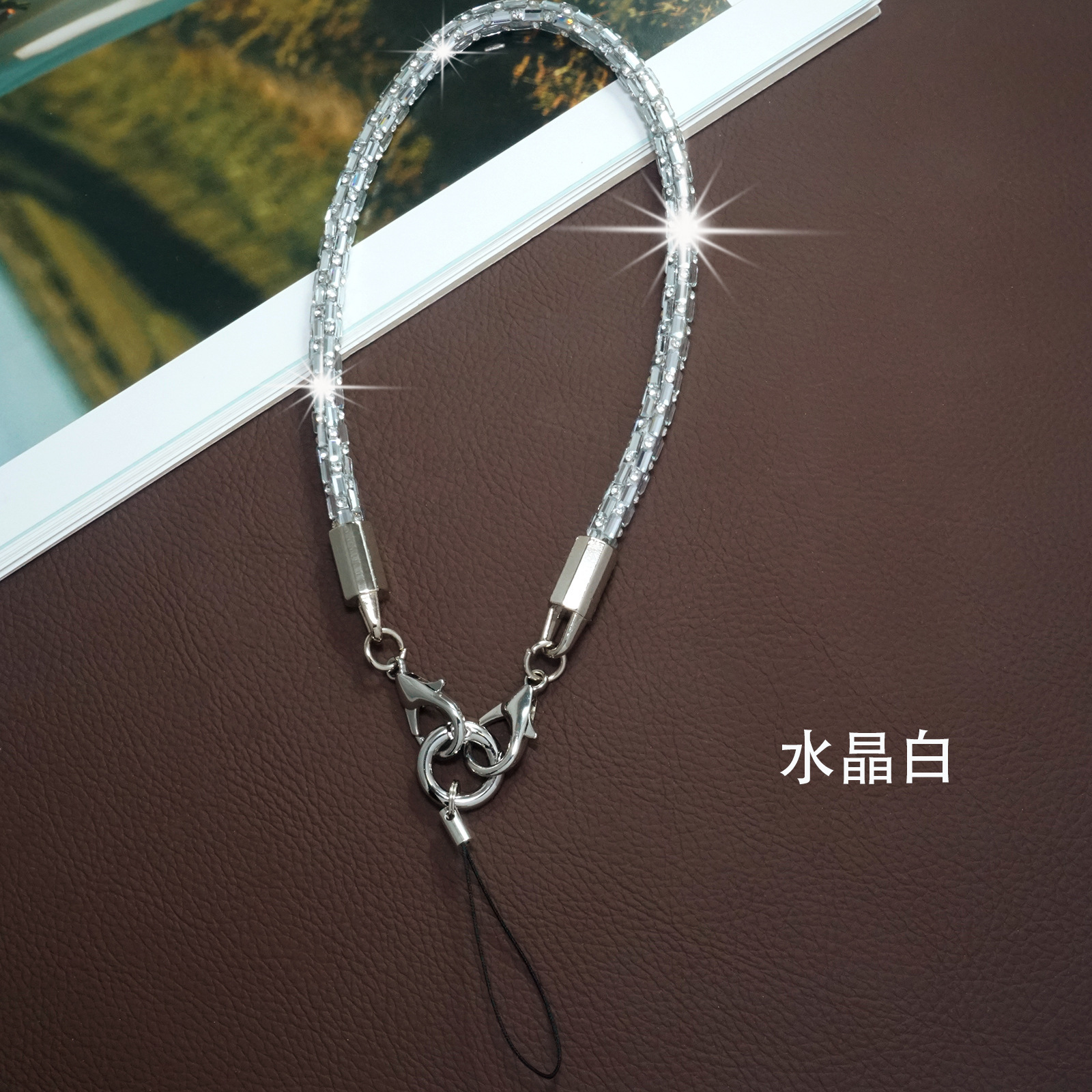 Nuevo cordón de teléfono móvil de cristal cuadrado de lujo de alta gama, cadena de mano de moda anti-pérdida y anti-caída, cuerda corta de muñeca