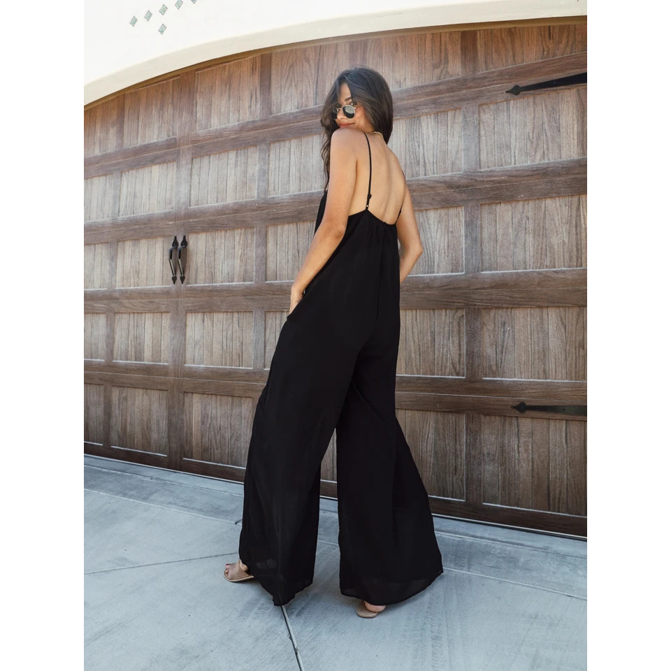 solid color V-neck suspenders loose backless holiday style jumpsuit NSOYL124064